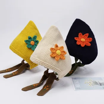 Популярная европейская и американская детская шерстяная вязаная шапка с милым цветочным рисунком, идеально подходящая для осени и зимы. Обеспечивает ear pro